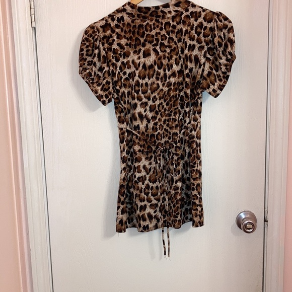 Heartsoul Animal print top with deep v neck with rouching around the v. - Picture 6 of 7
